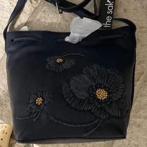 NWT The Sak Ivy Drawstring Leather Bucket Bag with flower detail embroidery !